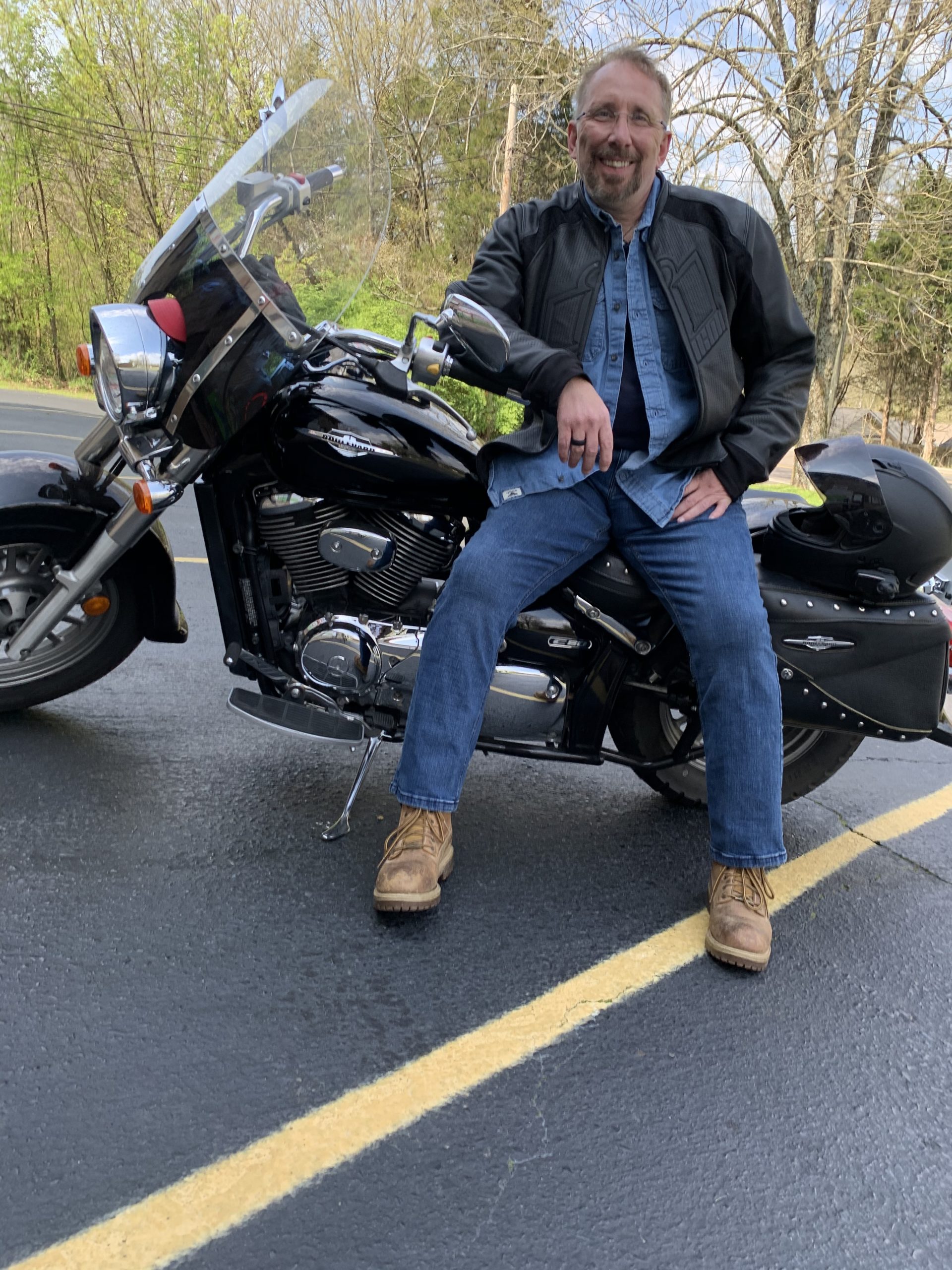 Chris Akers sitting on his motorcycle